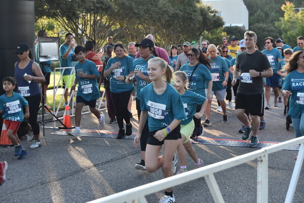 Group of people running during the 2024 race for hope. 